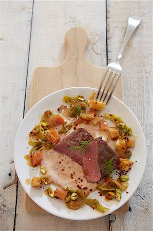simsearch:659-08148038,k - Saddle of lamb with root vegetables Stock Photo - Premium Royalty-Free, Code: 659-07028808