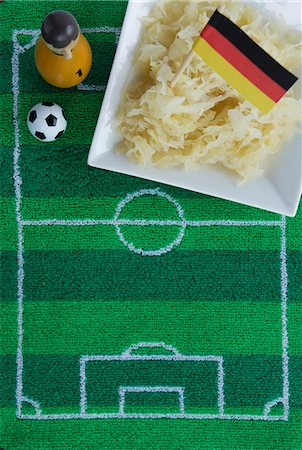 football field from above - Sauerkraut with a German flag and football-themed decoration Stock Photo - Premium Royalty-Free, Code: 659-07028917