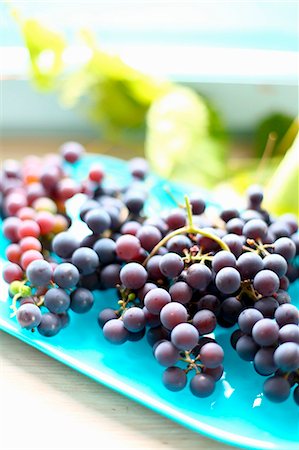 red grape - Fresh red grapes on a serving plate Stock Photo - Premium Royalty-Free, Code: 659-07068754
