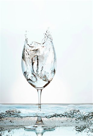 A wine glass filled with sparkling water Stock Photo - Premium Royalty-Free, Code: 659-07069414
