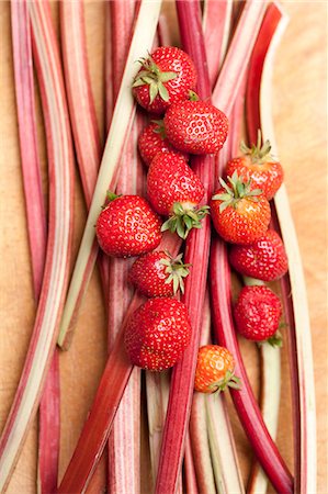 simsearch:659-08419643,k - A still life featuring strawberries and stalks of rhubarb Stock Photo - Premium Royalty-Free, Code: 659-07069609