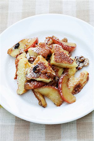 simsearch:659-01850806,k - Kaiserschmarren (shredded sugared pancake from Austria) with apples and walnuts Stock Photo - Premium Royalty-Free, Code: 659-07069703