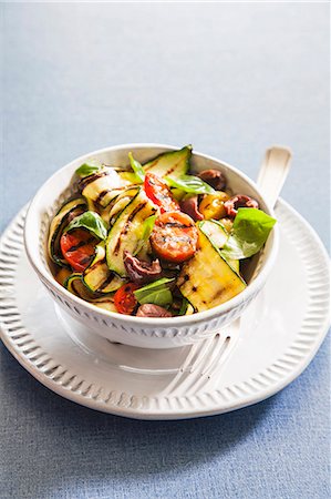 Grilled zucchini with tomatoes, olives and basil Stock Photo - Premium Royalty-Free, Code: 659-07597128