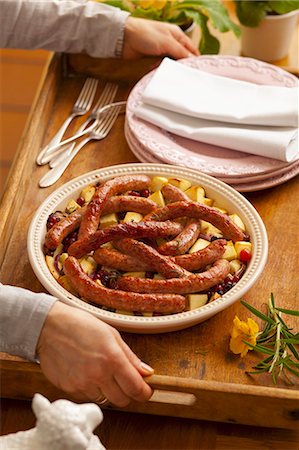 simsearch:400-06076985,k - Sausages on fried potatoes with cranberries Stock Photo - Premium Royalty-Free, Code: 659-07597196