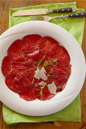 simsearch:659-07597225,k - Carpaccio of beef with capers, parmesan and rocket Stock Photo - Premium Royalty-Free, Code: 659-07597224