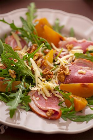 simsearch:659-07597225,k - A salad of boiled ham, rocket, walnuts, yellow plums and cheese Stock Photo - Premium Royalty-Free, Code: 659-07597225