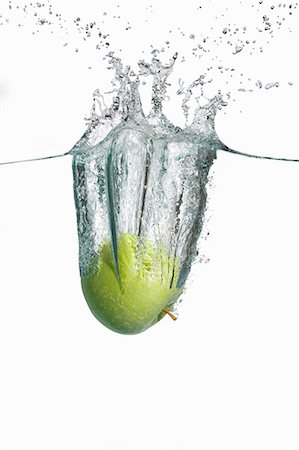 splash - A green apple falling into water Stock Photo - Premium Royalty-Free, Code: 659-07597244