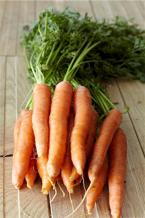 simsearch:659-07609605,k - Fresh carrots on wooden planks Stock Photo - Premium Royalty-Free, Code: 659-07597434