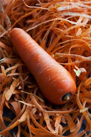 photos of vegetable garbage - A carrot on carrot peelings Stock Photo - Premium Royalty-Free, Code: 659-07597727