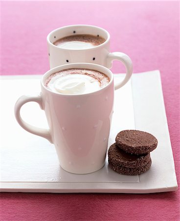 Hot chocolate with whipped cream and biscuits Stock Photo - Premium Royalty-Free, Code: 659-07597891