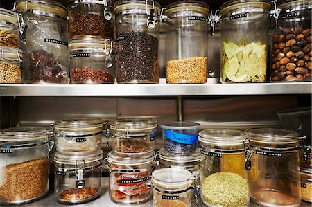 saving (keeping) - Assorted Dried Ingredients in Storage Containers on Metal Shelves Stock Photo - Premium Royalty-Free, Code: 659-07597958