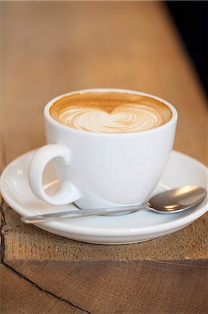 Cafe Latte in White Mug Stock Photo - Premium Royalty-Free, Code: 659-07598342