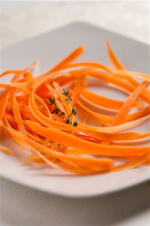 simsearch:659-07609605,k - Carrot strips and thyme on a plate Stock Photo - Premium Royalty-Free, Code: 659-07598984