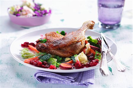 simsearch:659-01857024,k - Duck leg on savoy cabbage with cranberries Stock Photo - Premium Royalty-Free, Code: 659-07599399