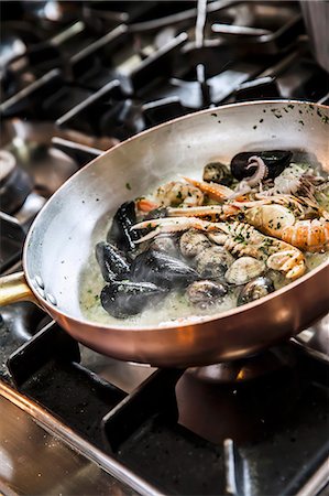 restaurant indoor - Seafood cooking in white wine Stock Photo - Premium Royalty-Free, Code: 659-07609656