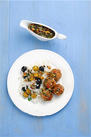 simsearch:659-08147216,k - Pork meatballs with rice and olive sauce Stock Photo - Premium Royalty-Free, Code: 659-07609841