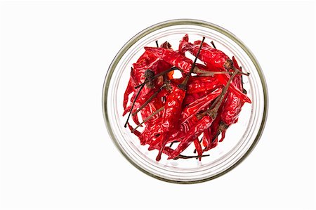 simsearch:659-07026815,k - Dried red chillies in a glass bowl Foto de stock - Sin royalties Premium, Código: 659-07609895