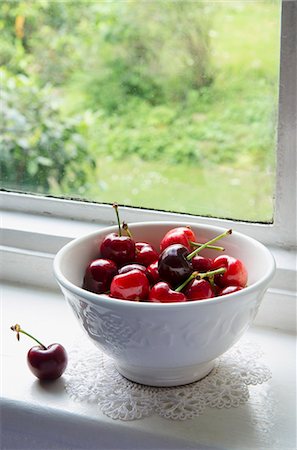simsearch:659-07597339,k - A bowl of fresh cherries on a windowsill Stock Photo - Premium Royalty-Free, Code: 659-07610101
