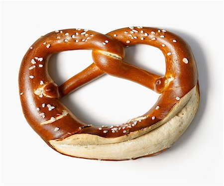 soft pretzel food photography - A salted lye pretzel Stock Photo - Premium Royalty-Free, Code: 659-07610320