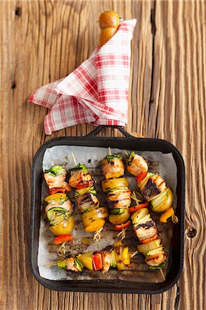 Salmon and potatoes skewers with peppers and courgettes Stock Photo - Premium Royalty-Free, Code: 659-07739227