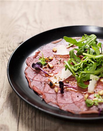 simsearch:659-07597225,k - Beef carpaccio with rocket and Parmesan Stock Photo - Premium Royalty-Free, Code: 659-07958862