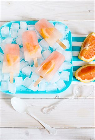 fruits in wooden table - Grapefruit ice lollies Stock Photo - Premium Royalty-Free, Code: 659-07958939