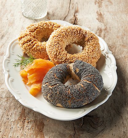 Three different bagels with smoked salmon and dill Stock Photo - Premium Royalty-Free, Code: 659-07959401