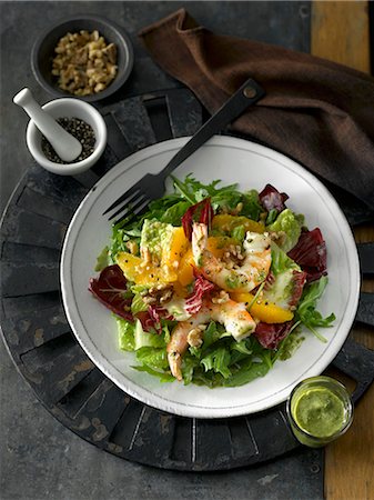 salad images - Winter salad with radicchio, shrimps, oranges, pepper and a Dijon mustard dressing Stock Photo - Premium Royalty-Free, Code: 659-07959477