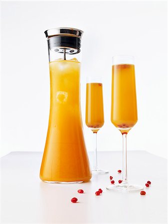 Christmas champagne cocktail in a glass and in a carafe Stock Photo - Premium Royalty-Free, Code: 659-07959726