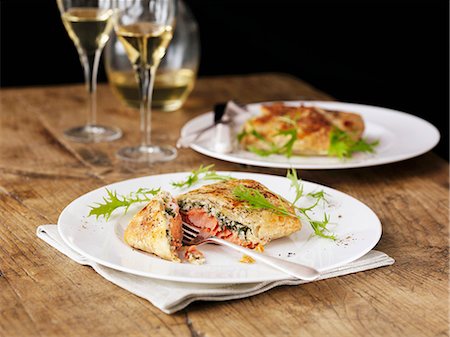 salmon - Salmon in puff pastry with rocket Stock Photo - Premium Royalty-Free, Code: 659-07959881
