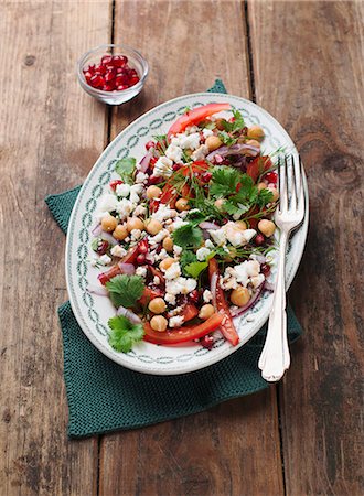 Chickpea salad with peppers, feta cheese and pomegranate seeds Stock Photo - Premium Royalty-Free, Code: 659-08147263