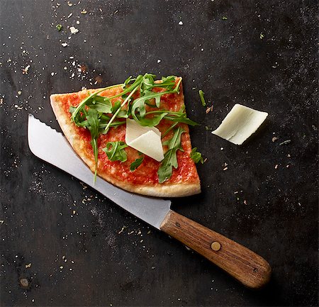 Pizza Margherita with rocket and Parmesan Stock Photo - Premium Royalty-Free, Code: 659-08147624