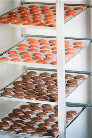 simsearch:659-06188604,k - Macaroons being made: halves drying on baking trays Stock Photo - Premium Royalty-Free, Code: 659-08418768