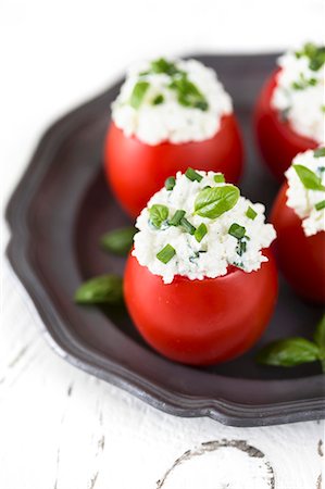 simsearch:659-06373046,k - Tomatoes stuffed with cottage cheese, fresh chives and basil Stock Photo - Premium Royalty-Free, Code: 659-08418961