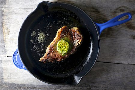 simsearch:659-08148038,k - Steak with herb butter in a pan (seen from above) Stock Photo - Premium Royalty-Free, Code: 659-08419278
