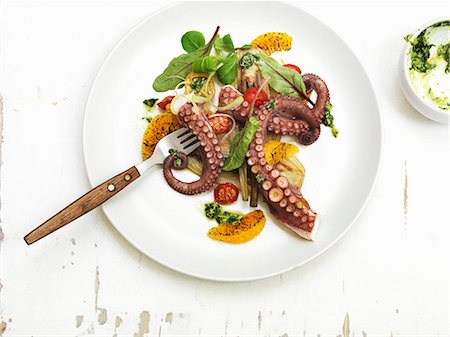 Octopus salad with cherry tomatoes and oranges Stock Photo - Premium Royalty-Free, Code: 659-08419376