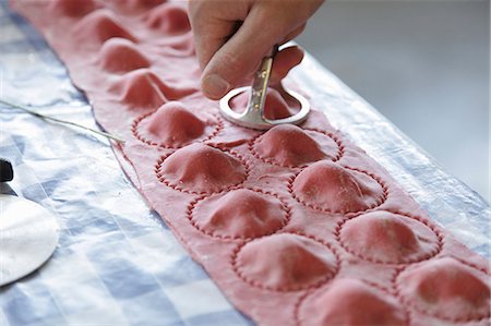 Red ravioli being made Stock Photo - Premium Royalty-Free, Code: 659-08419389