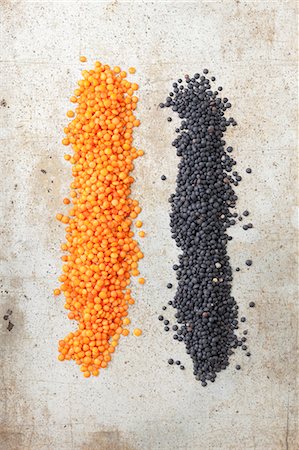 Red and black lentils on a stone surface Stock Photo - Premium Royalty-Free, Code: 659-08419517