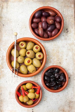 simsearch:659-08147216,k - Various olives: dried, Kalamata, stuffed with pepper and stuffed with piri piri Stock Photo - Premium Royalty-Free, Code: 659-08419586