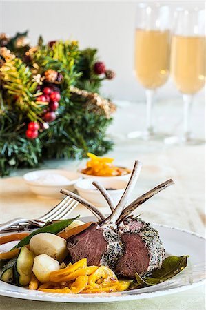 simsearch:659-06186142,k - Lamb chops with a herb crust and a side of vegetables (Christmas) Stock Photo - Premium Royalty-Free, Code: 659-08419905