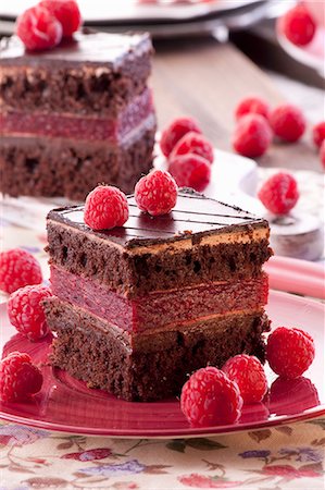 simsearch:659-01848790,k - Chocolate sponge cake with a raspberry cream filling Stock Photo - Premium Royalty-Free, Code: 659-08419938