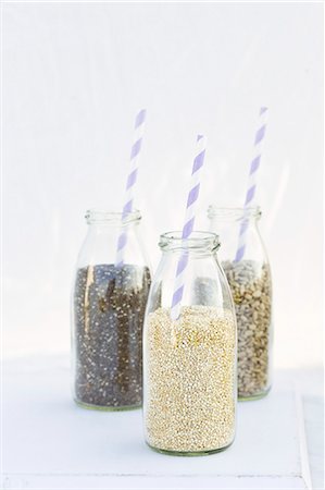simsearch:659-08419643,k - Chia, sunflower seeds and quinoa in milk bottles Stock Photo - Premium Royalty-Free, Code: 659-08419969