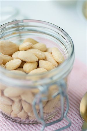 simsearch:659-07027183,k - A jar of shelled almonds Stock Photo - Premium Royalty-Free, Code: 659-08420042