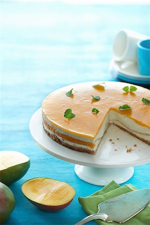 simsearch:659-06185283,k - Cheesecake with mango and mint Stock Photo - Premium Royalty-Free, Code: 659-08420074