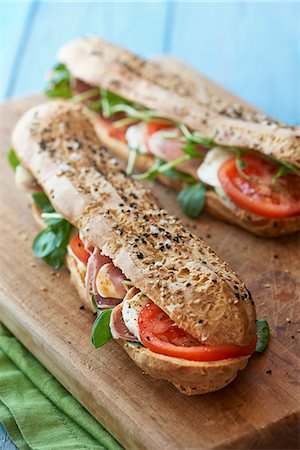 Ham, mozzarella and tomato baguettes Stock Photo - Premium Royalty-Free, Code: 659-08420203