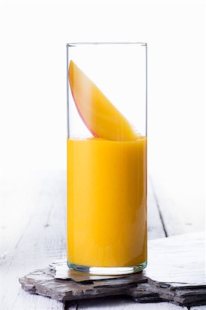 simsearch:659-07027183,k - A mango smoothie Stock Photo - Premium Royalty-Free, Code: 659-08420354