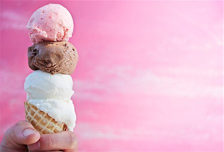 Vanilla, chocolate and strawberry ice cream in a cone Stock Photo - Premium Royalty-Free, Code: 659-08420371