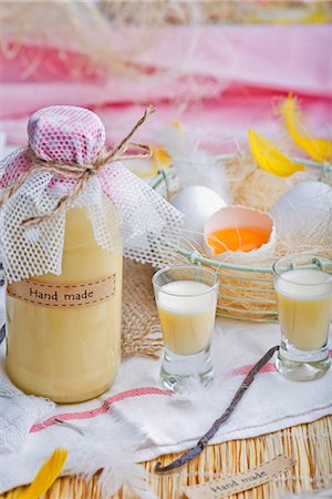 simsearch:659-06901837,k - Homemade eggnog and a wire basket of fresh egg Stock Photo - Premium Royalty-Free, Code: 659-08513122