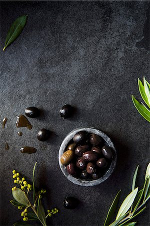 simsearch:659-08147216,k - A bowl of olives with olive leaves Stock Photo - Premium Royalty-Free, Code: 659-08895428
