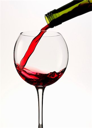 simsearch:659-06186663,k - Red wine being poured into a glass Stock Photo - Premium Royalty-Free, Code: 659-08895460